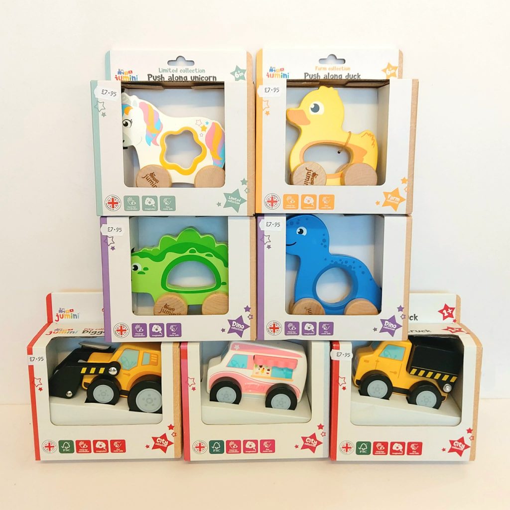 Close-up of wooden toys and puzzles on display in store