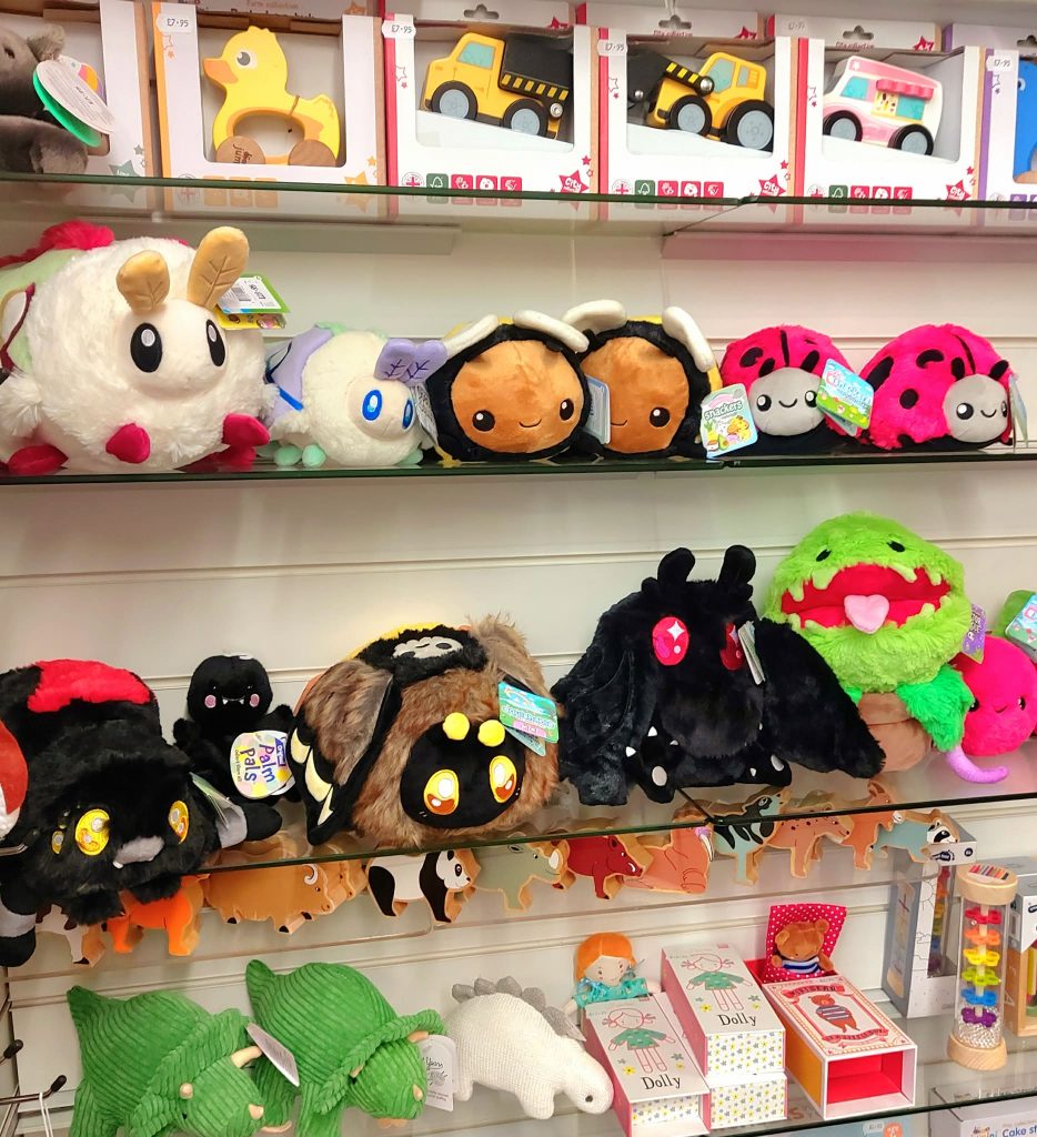 Close-up of wooden toys and puzzles on display in store